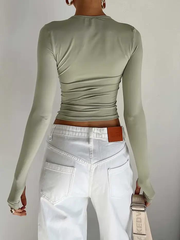 Mode femmes T-shirt à manches longues col rond solide coupe ajustée dames haut court avec trous pour