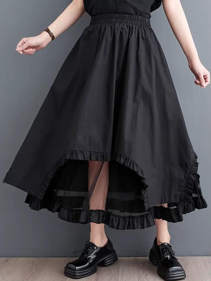 Jupe mi-longue décontractée noire vintage à empiècements en maille, taille haute, coupe irrégulière,