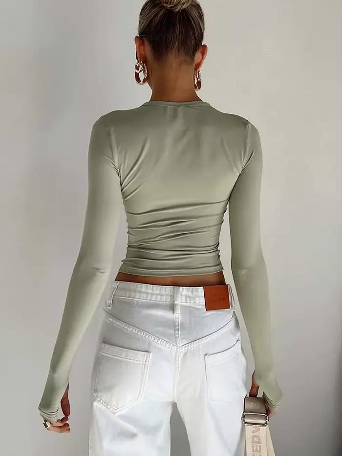 Mode femmes T-shirt à manches longues col rond solide coupe ajustée dames haut court avec trous pour