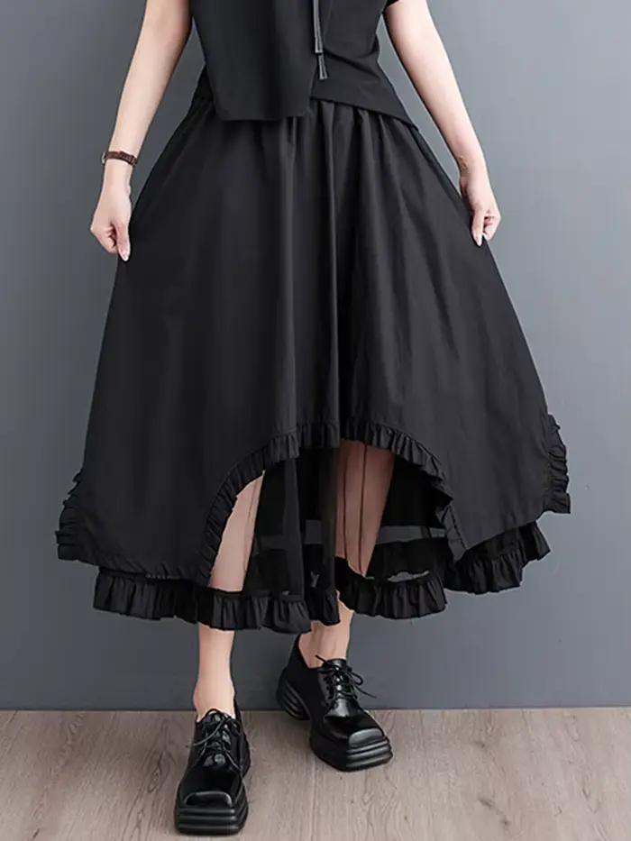 Jupe mi-longue décontractée noire vintage à empiècements en maille, taille haute, coupe irrégulière,