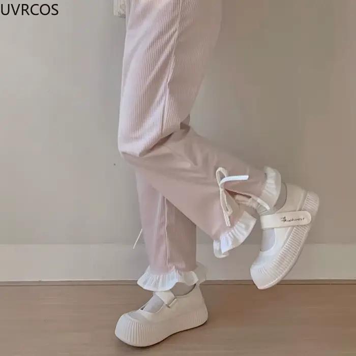 Pantalon en velours côtelé à nœud rose pour femme, style Sweet Lolita, volants Kawaii, bandage latér