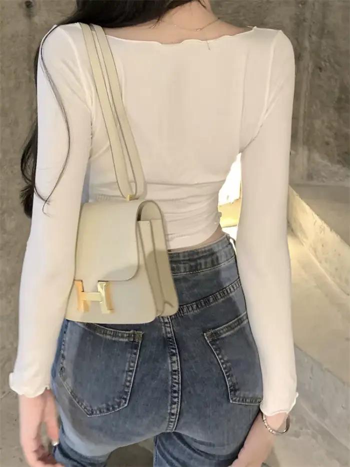 Manches longues T-shirts femmes récolte maigre résistant au soleil col en v rétro doux Sexy jeune St