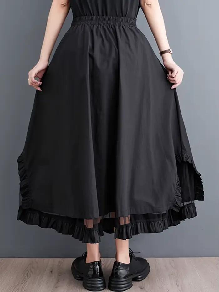 Jupe mi-longue décontractée noire vintage à empiècements en maille, taille haute, coupe irrégulière,