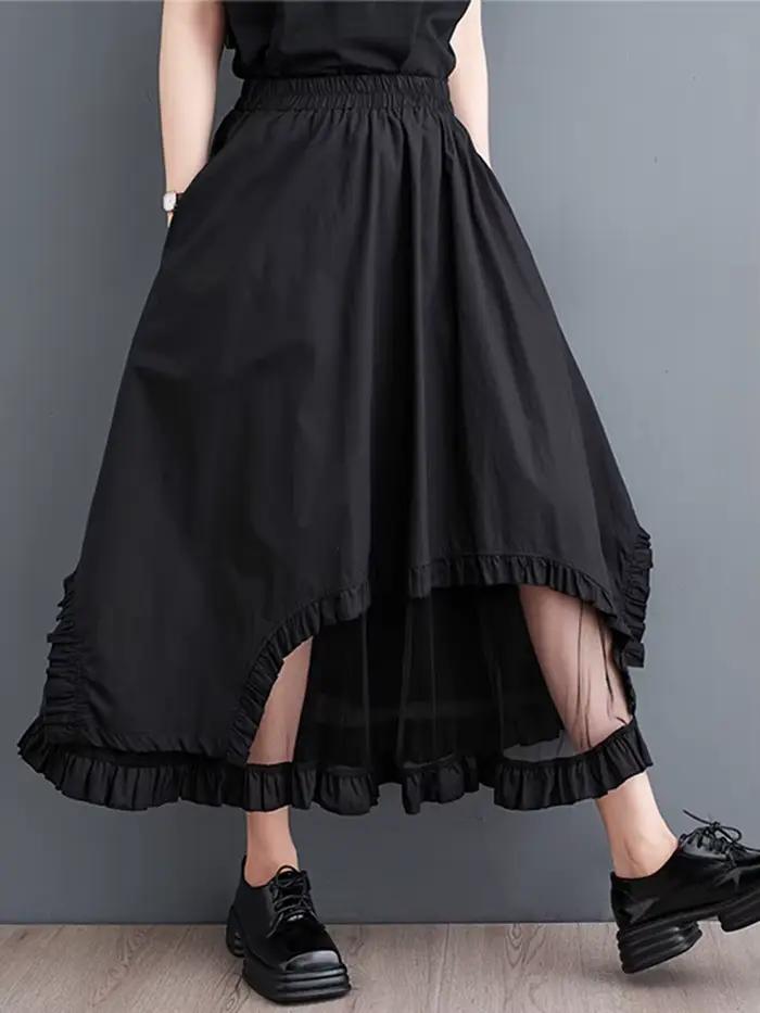 Jupe mi-longue décontractée noire vintage à empiècements en maille, taille haute, coupe irrégulière,