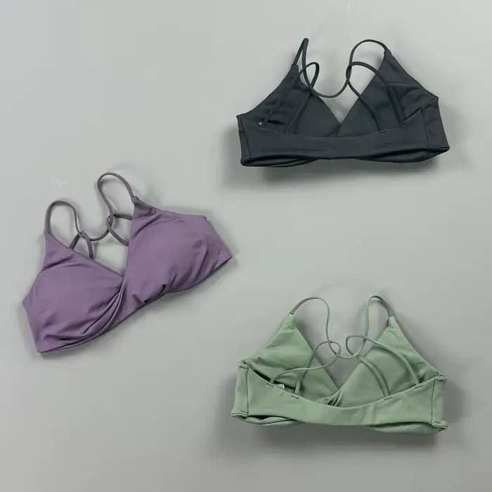 Soutien-gorge de sport Vision Fitness pour femme, col en V, devant torsadé, bretelles fines, dos croisé, sans coutures, coussinets amovibles, extensible et doux, pour yoga et entraînement