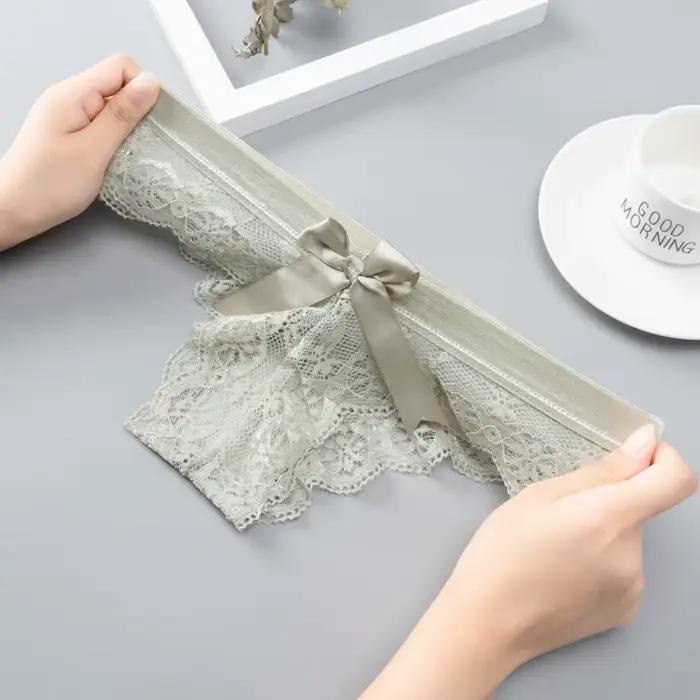 Incroyable femmes Lingerie G String sous-vêtements en dentelle femme nœud Sexy t-back String dame Transparent taille basse culotte