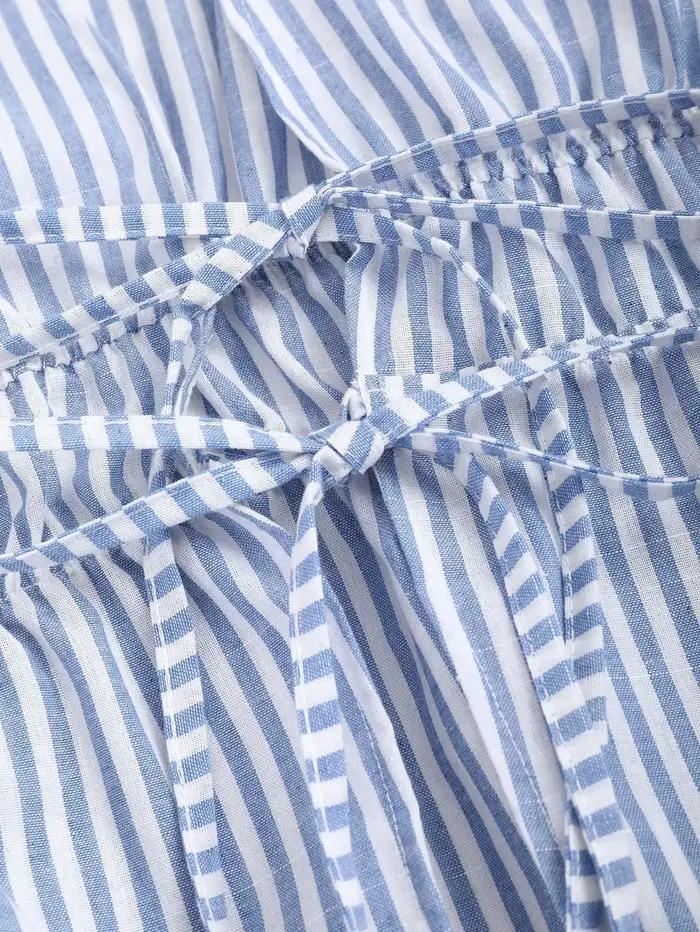 Chemise à manches bouffantes avec nœud à nouer rayé