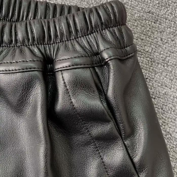Shorts en cuir PU pour femmes HKSH 2026, style sombre RO, fente latérale, bloc de couleur, taille él